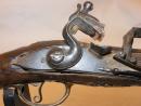 Long pistolet à garnitures argent et bronze, vers 1730