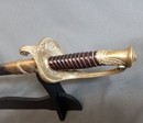 Sabre d'officier d'infanterie modèle 1845. Fourreau sans bouterole, un anneau manquant.