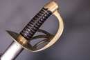 Sabre de cuirassier modèle an XIII, pointe dans le prolongement de la lame. Belle pièce d'époque.