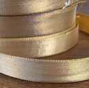 Ruban satin or mi-fin, 19 mm large. PRIX PAR ROULEAU DE 36 m minimum.