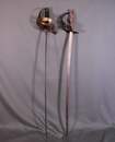 Lot de 2 sabres, dont un prussien pour l'escrime au sabre. En l'état.