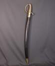 Sabre briquet, fabriqué en janvier 1813, garde poinçonnée de VERSAILLES, avec fourreau de reconstitution patiné.