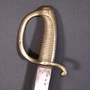 Sabre briquet, fabriqué en janvier 1813, garde poinçonnée de VERSAILLES, avec fourreau de reconstitution patiné.