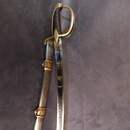 Sabre d'officier de cavalerie légère à la chasseur, Empire/ restauration. Lame bleuie dorée. Fourreau à garnitures laiton