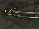 Sabre d'officier de cavalerie légère à la chasseur, Empire. Lame gravée à l'aigle couronné. Fourreau à garnitures laiton 