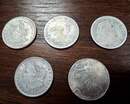 Et pendant ce temps, de l'autre côté de l'Atlantique...Pièces de 1 $ US, copies en nombre limité, prix à l'unité