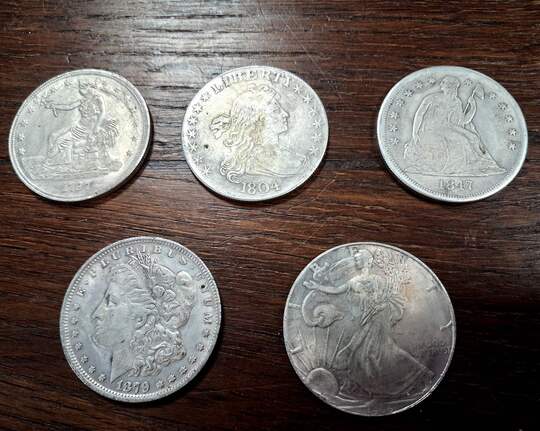 Et pendant ce temps, de l'autre côté de l'Atlantique...Pièces de 1 $ US, copies en nombre limité, prix à l'unité